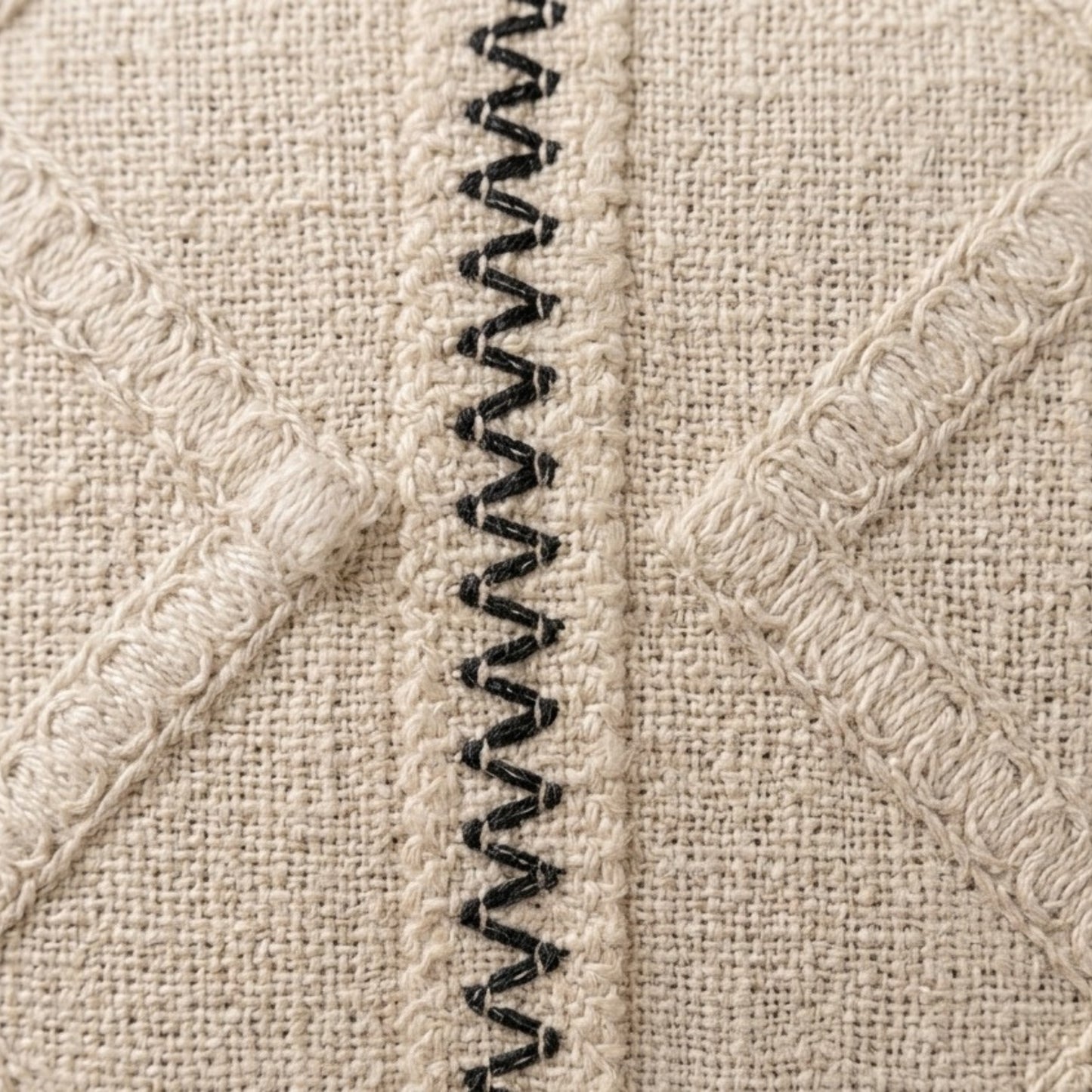 Neutral cotton cushion cover with embroidered geometric design
